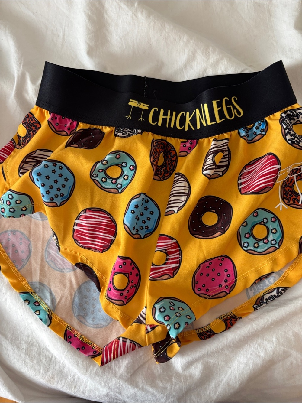 ChicknLegs Women's Yellow Donut Print Athletic Shorts